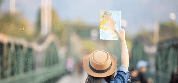 female-tourists-hand-have-happy-travel-map