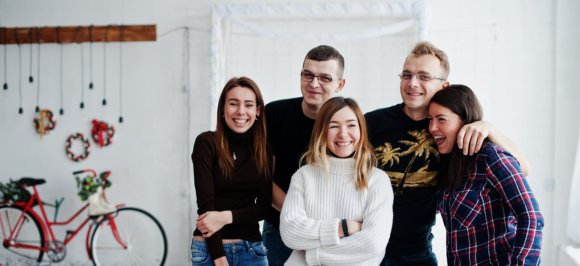 group-five-peoples-friends-photographers-designers-studio-shooting-after-hard-work-day-they-happy-laughing 1